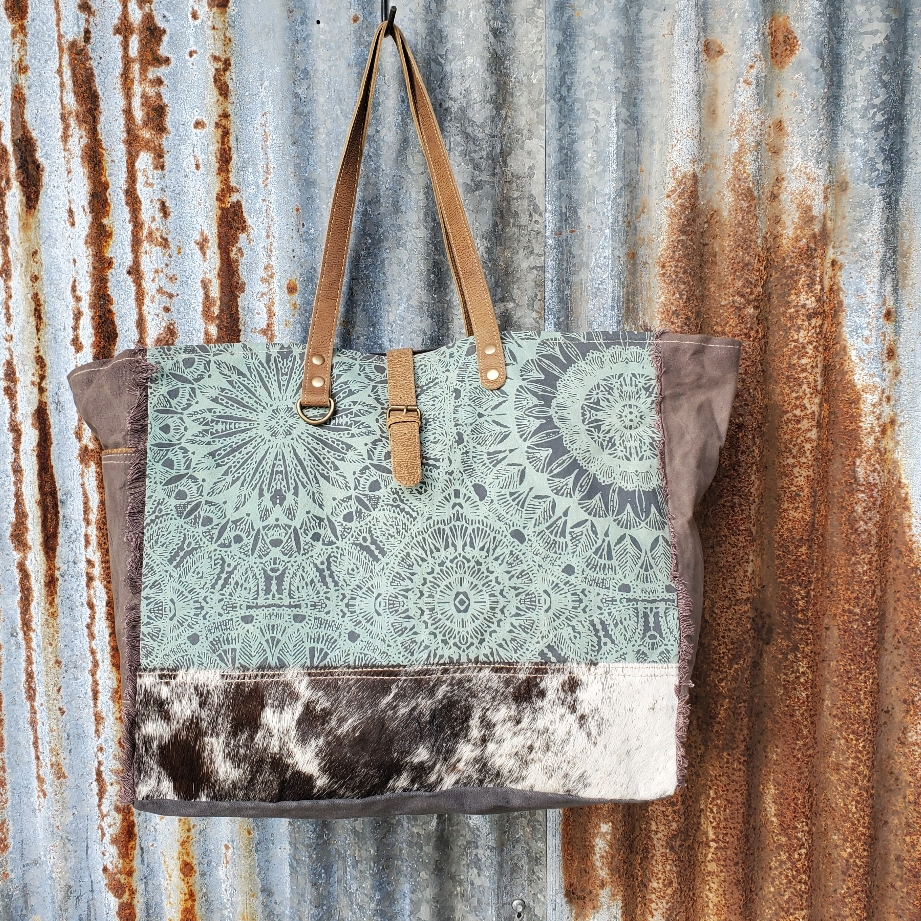 Turquoise and Cowhide Weekender Front