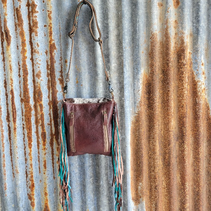 Teal Cowhide Fringe Conceal Back