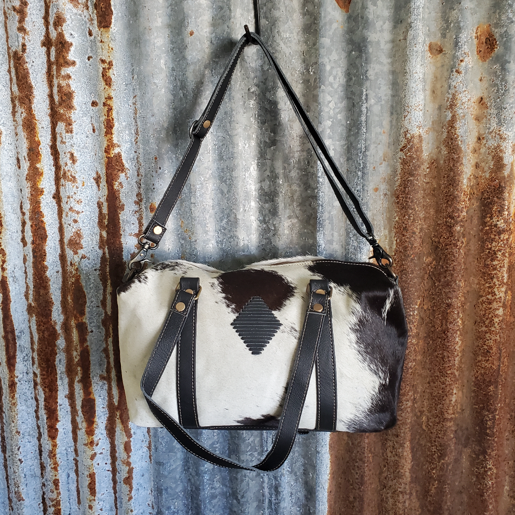 Black and White Cowhide Mini Duffle Front